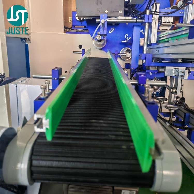Automatic stacking and counting system for screen printed paper cups