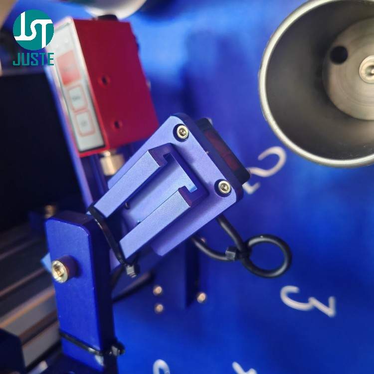 Empty fixture detection sensor on automatic cup screen printer